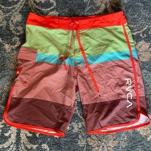 Like new, multi color board shorts